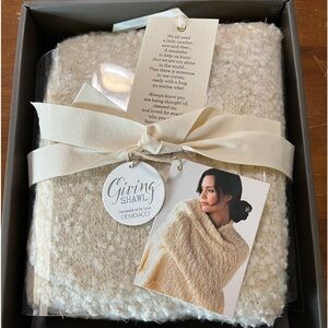 Beautiful cream colored shawl. Brand new with tags.